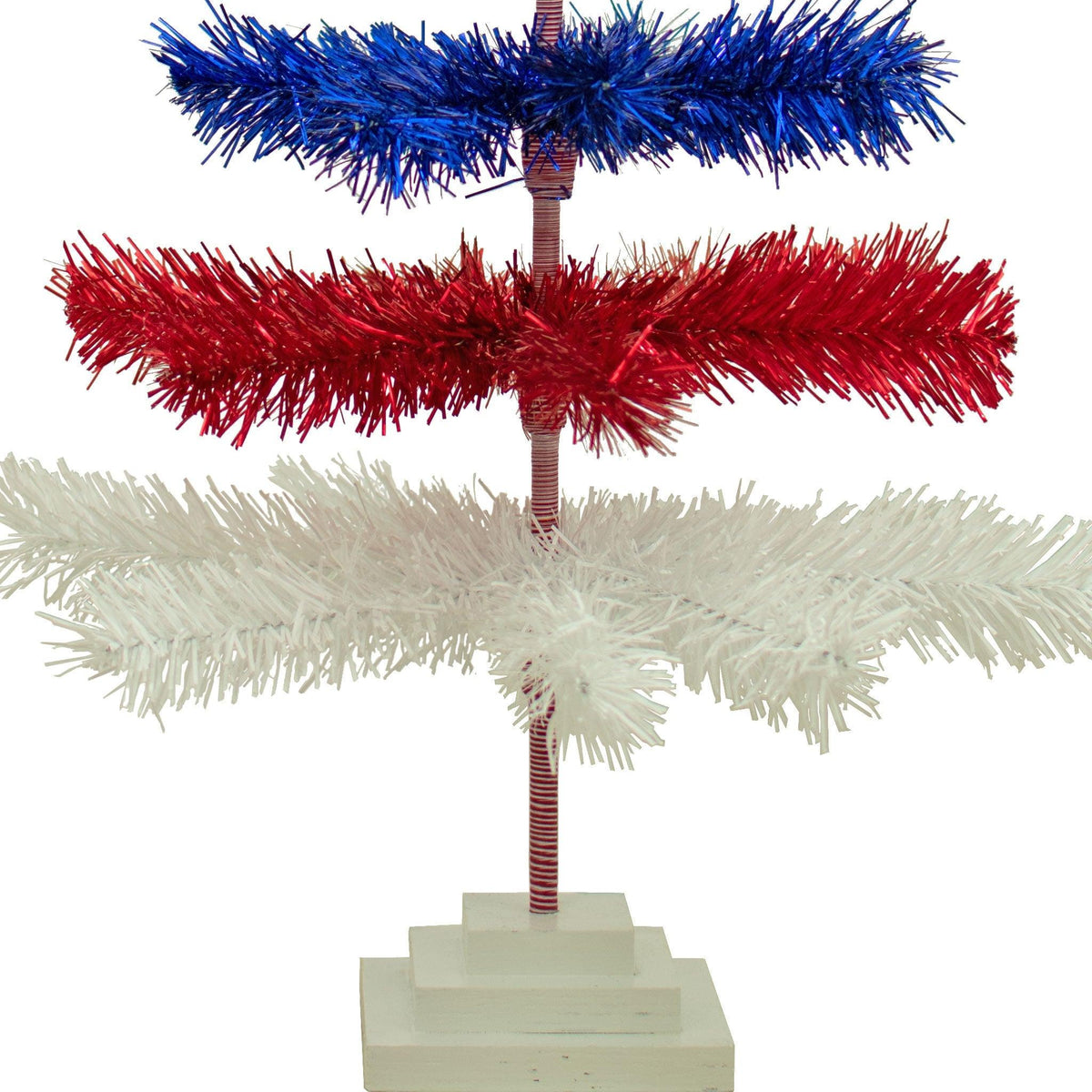 36in tall Red, White, and Blue Layered Tinsel Christmas Trees made by hand in the USA.  Decorate for the holidays with retro 4th of July-themed Trees and start creating your centerpiece now.  Shop for more at leedisplay.com