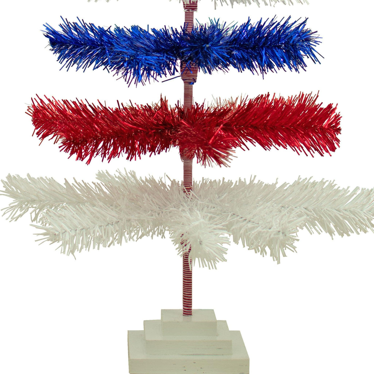 48in tall Red, White, and Blue Layered Tinsel Christmas Trees made by hand in the USA.  Decorate for the holidays with retro 4th of July-themed Trees and start creating your centerpiece now.  Shop for more at leedisplay.com