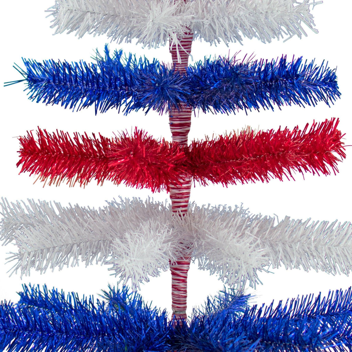 60in tall Red, White, and Blue Layered Tinsel Christmas Trees made by hand in the USA.  Decorate for the holidays with retro 4th of July-themed Trees and start creating your centerpiece now.  Shop for more at leedisplay.com