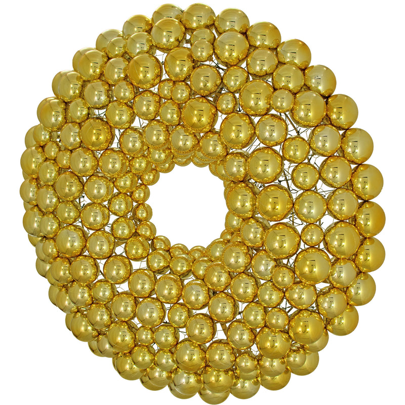 The Gold Ball Ornament Wreath is made with different sizes of shiny plastic ball ornaments.