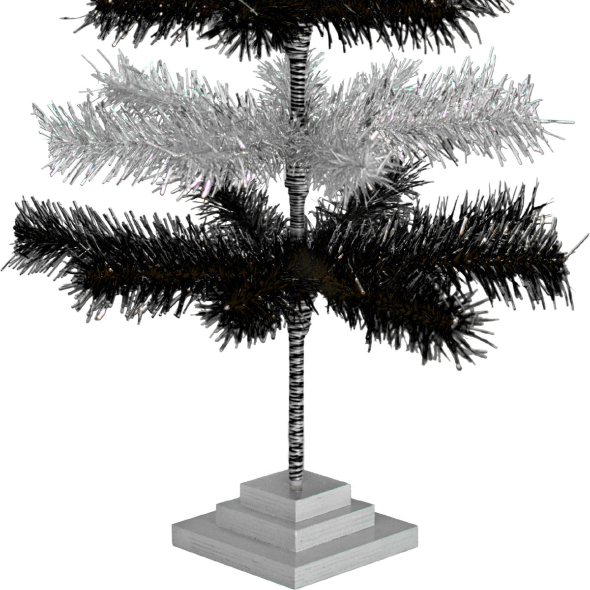 Black & Silver Layered Tinsel Christmas Trees!    Decorate for the holidays with a Shiny Black and Metallic Silver retro-style Christmas Tree.  On sale now at leedisplay.com