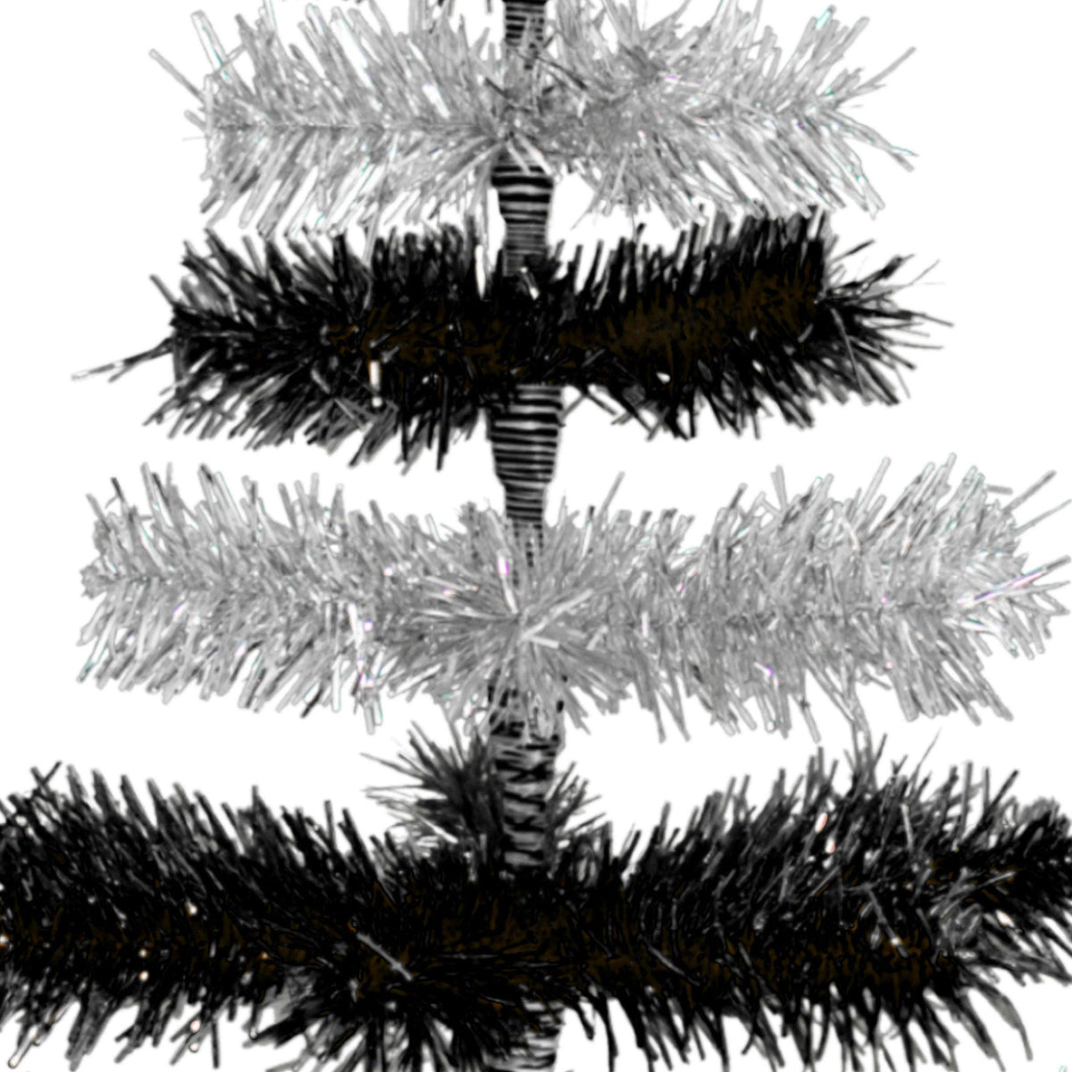 Black & Silver Layered Tinsel Christmas Trees!    Decorate for the holidays with a Shiny Black and Metallic Silver retro-style Christmas Tree.  On sale now at leedisplay.com