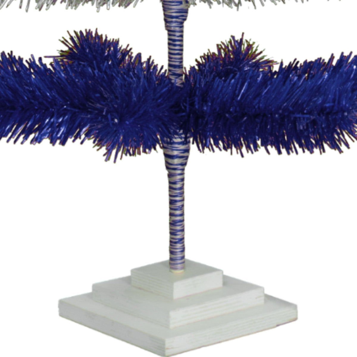 Metallic Blue and Shiny Silver Layered Tinsel Christmas Trees!    Decorate for the holidays with a Silver and Blue retro-style Christmas Tree.  Shop now at leedisplay.com