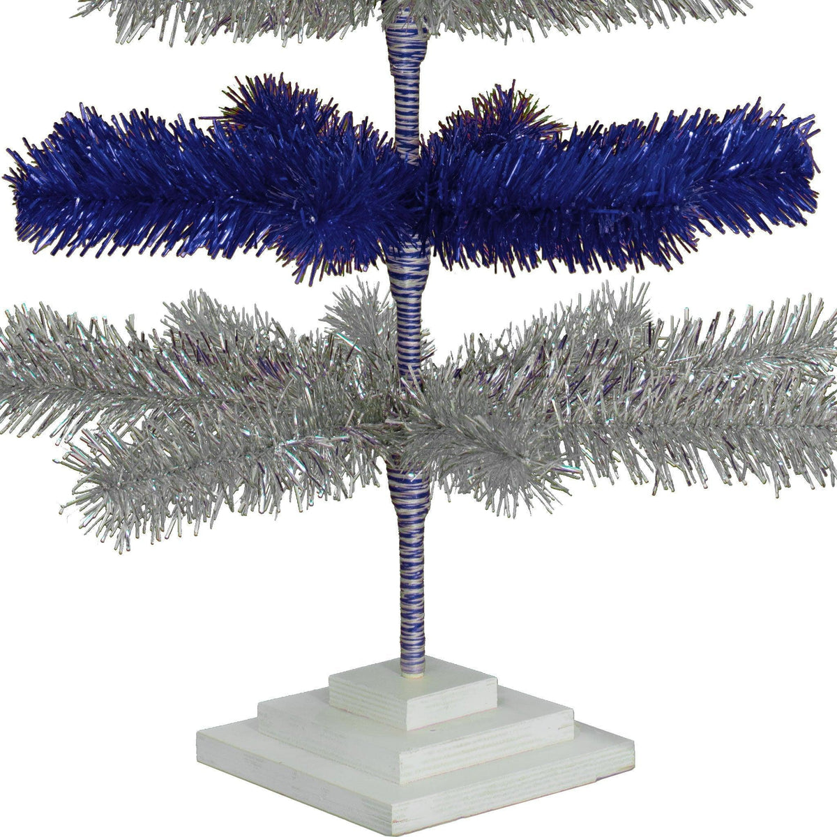 Metallic Blue and Shiny Silver Layered Tinsel Christmas Trees!    Decorate for the holidays with a Silver and Blue retro-style Christmas Tree.  Shop now at leedisplay.com