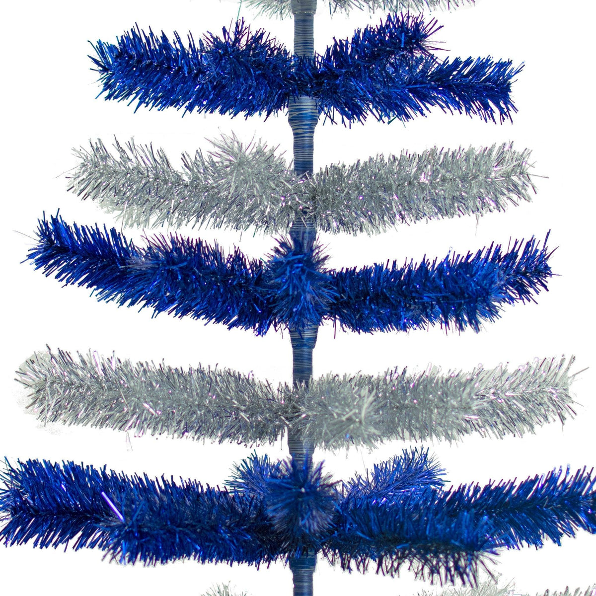 Metallic Blue and Shiny Silver Layered Tinsel Christmas Trees!    Decorate for the holidays with a Silver and Blue retro-style Christmas Tree.  Shop now at leedisplay.com