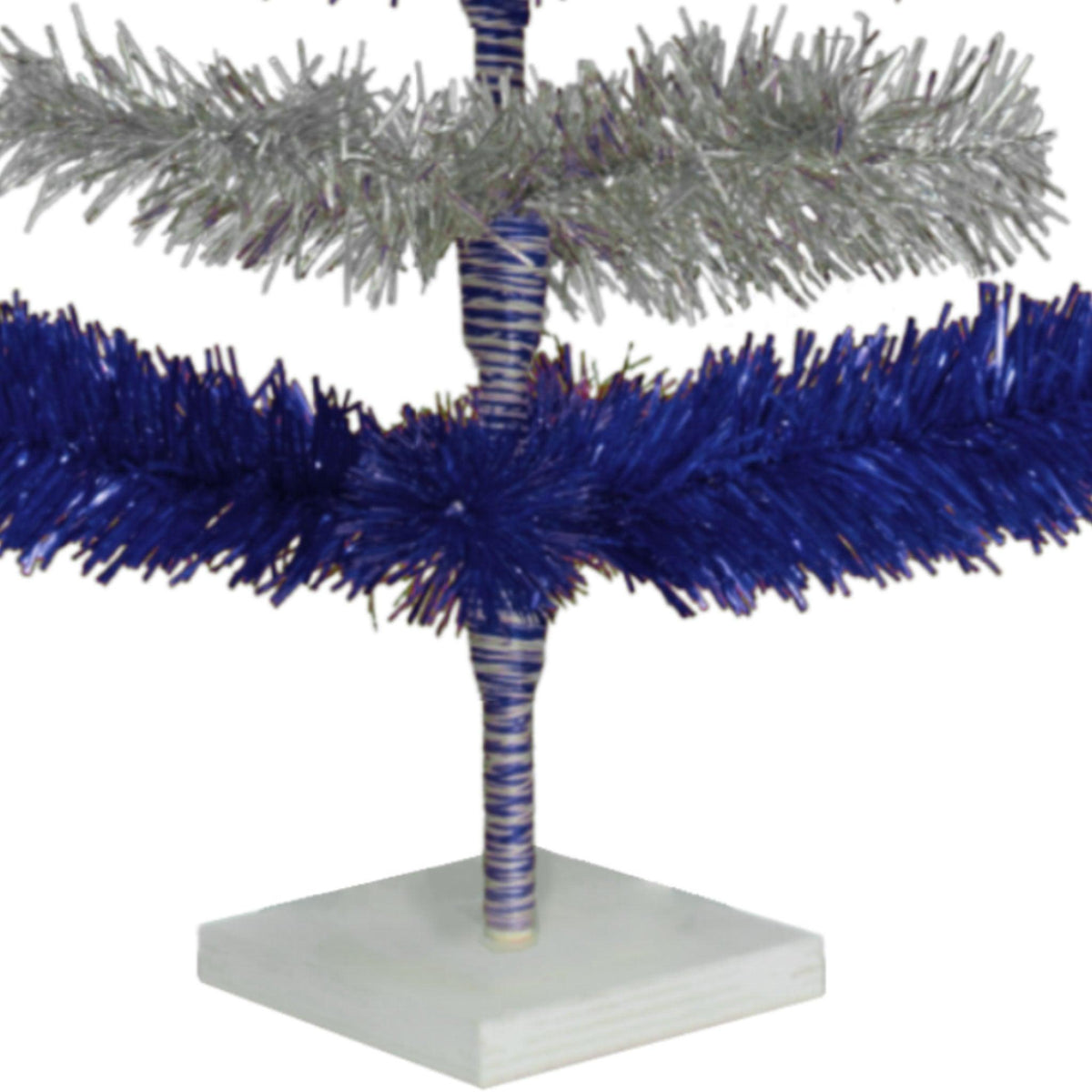 Metallic Blue and Shiny Silver Layered Tinsel Christmas Trees!    Decorate for the holidays with a Silver and Blue retro-style Christmas Tree.  Shop now at leedisplay.com