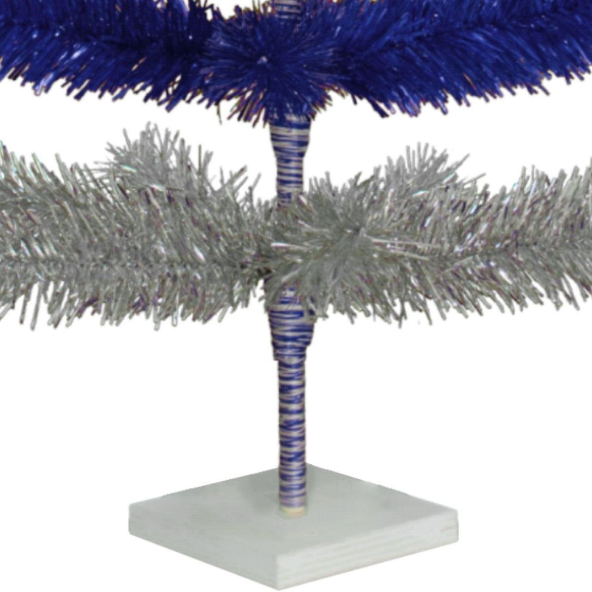 Metallic Blue and Shiny Silver Layered Tinsel Christmas Trees!    Decorate for the holidays with a Silver and Blue retro-style Christmas Tree.  Shop now at leedisplay.com