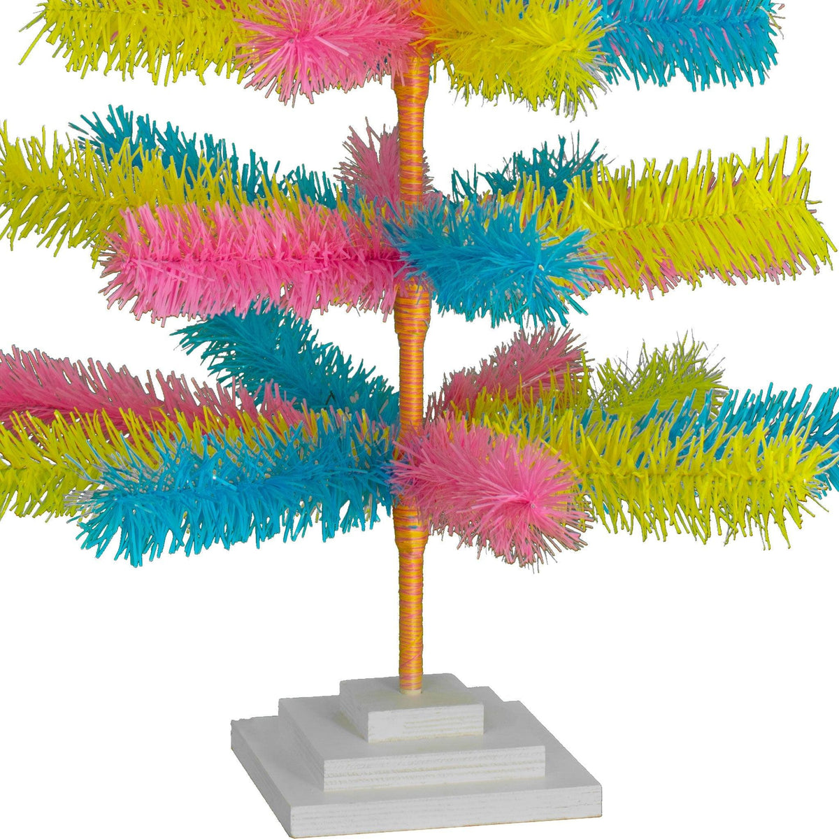 Lee Display's Original Easter-themed Mixed Tinsel Christmas Trees!    Decorate for the holidays with retro Pink, Blue, and Yellow Christmas Trees and start creating your centerpiece.  On sale now with leedisplay.com