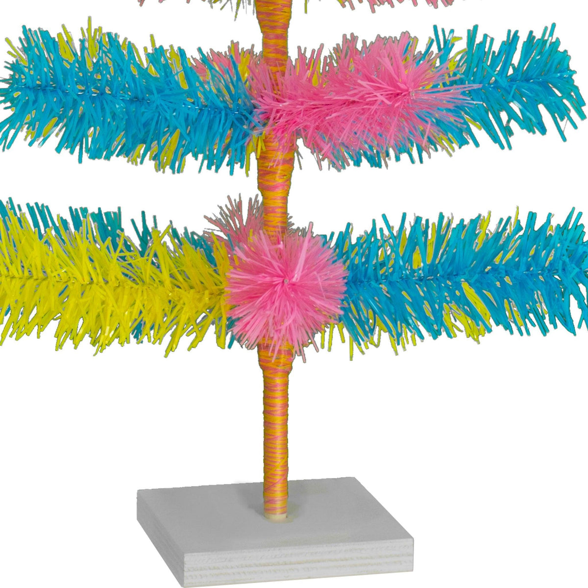 Lee Display's Original Easter-themed Mixed Tinsel Christmas Trees!    Decorate for the holidays with retro Pink, Blue, and Yellow Christmas Trees and start creating your centerpiece.  On sale now with leedisplay.com