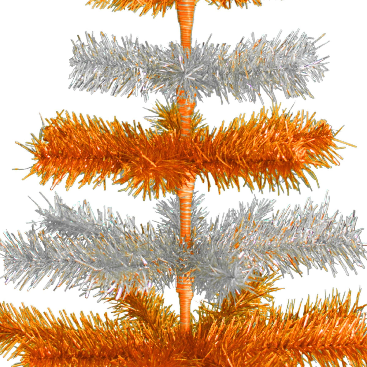 Orange & Silver Layered Tinsel Christmas Trees!    Decorate for the holidays with a Shiny Orange and Metallic Silver retro-style Christmas Tree.  On sale now at leedisplay.com