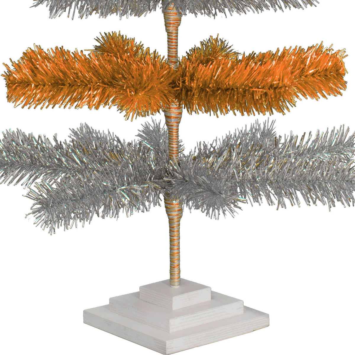 48in Tall Orange & Silver Layered Tinsel Christmas Trees! Decorate for the holidays with a Shiny Orange and Metallic Silver retro-style Christmas Tree. On sale now at leedisplay.com