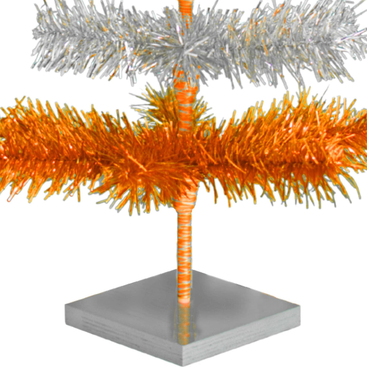 Orange & Silver Layered Tinsel Christmas Trees!    Decorate for the holidays with a Shiny Orange and Metallic Silver retro-style Christmas Tree.  On sale now at leedisplay.com