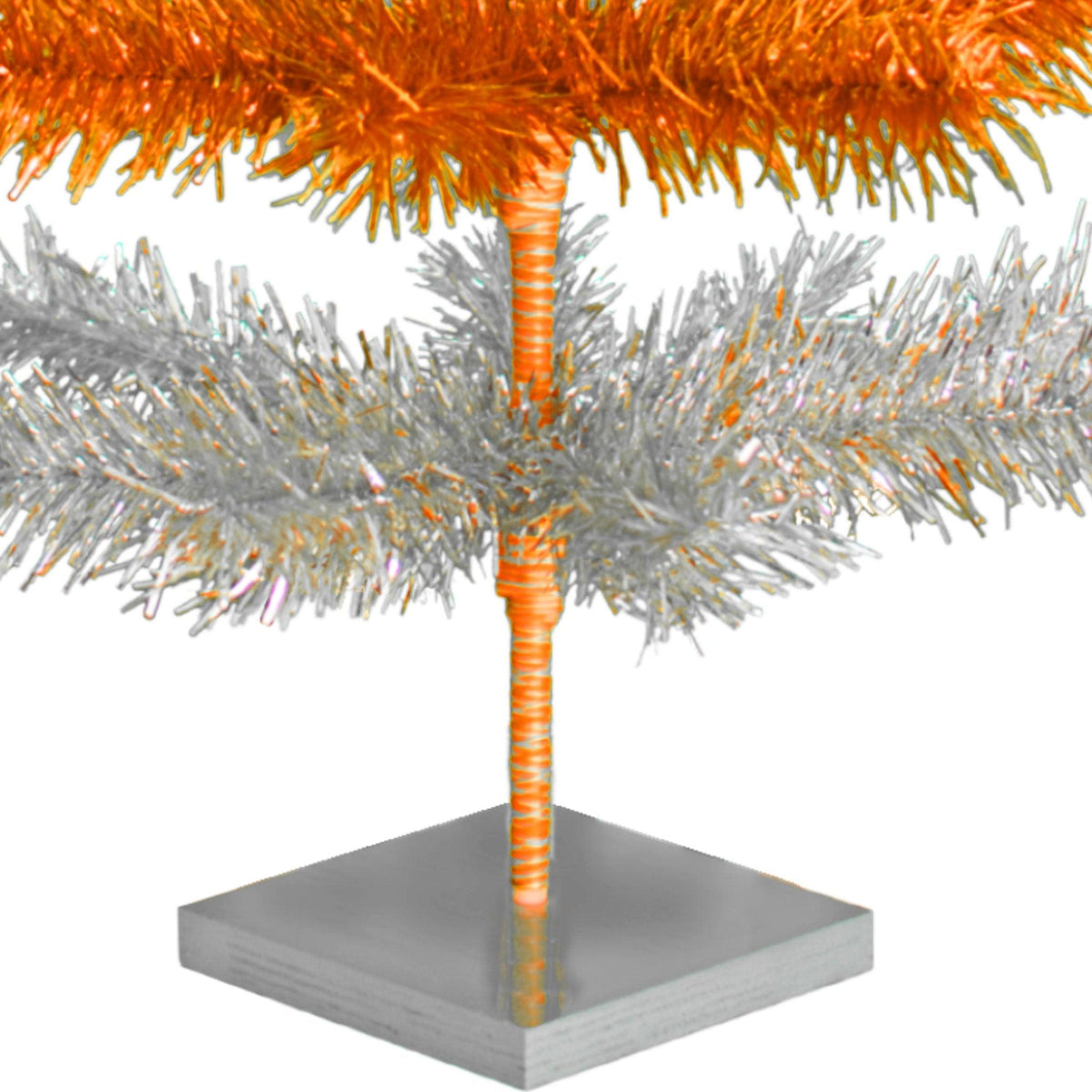 Orange & Silver Layered Tinsel Christmas Trees!    Decorate for the holidays with a Shiny Orange and Metallic Silver retro-style Christmas Tree.  On sale now at leedisplay.com