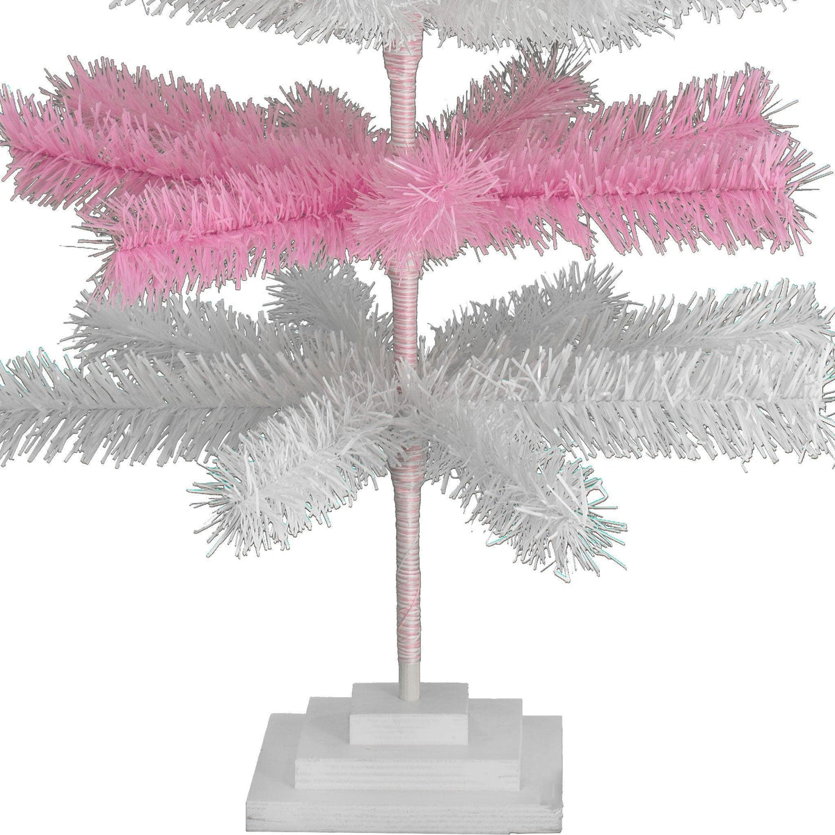 Pink & White Layered Tinsel Christmas Trees!    Decorate for the holidays with a Shiny Pink and Matte White retro-style Christmas Tree.  Incorporate a little purple and white into your holiday decorations this year. On sale at leedisplay.com