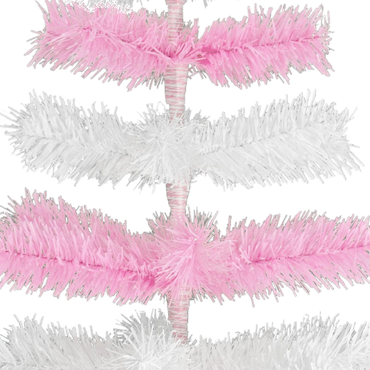 Pink & White Layered Tinsel Christmas Trees! Decorate for the holidays with a Shiny Pink and Matte White retro-style Christmas Tree. Incorporate a little purple and white into your holiday decorations this year. On sale at leedisplay.com