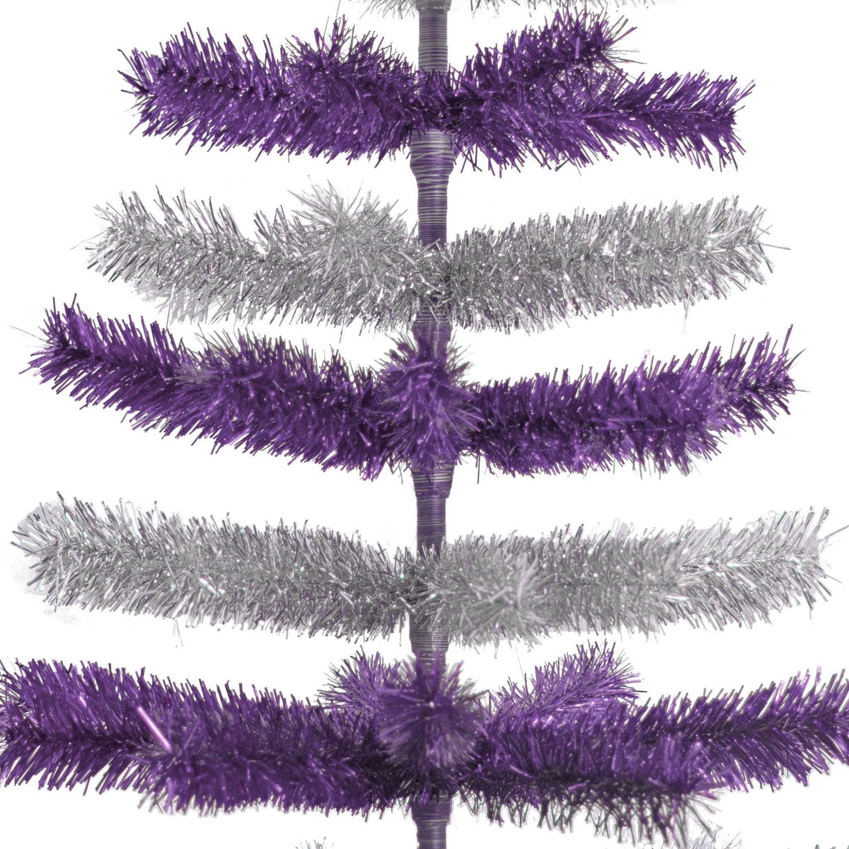 Purple & Silver Layered Tinsel Christmas Trees!    Decorate for the holidays with a Shiny Purple and Metallic Silver retro-style Christmas Tree.  On sale now at leedisplay.com