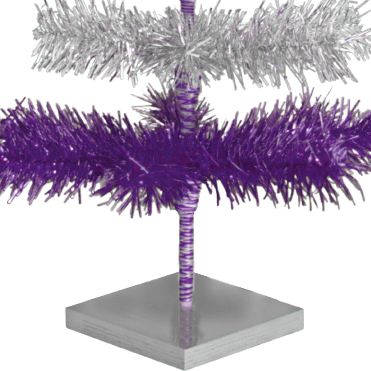 Purple & Silver Layered Tinsel Christmas Trees!    Decorate for the holidays with a Shiny Purple and Metallic Silver retro-style Christmas Tree.  On sale now at leedisplay.com