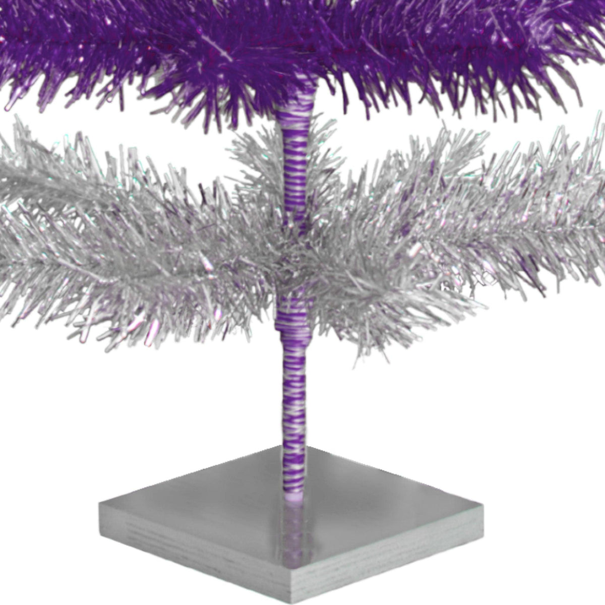 Purple & Silver Layered Tinsel Christmas Trees!    Decorate for the holidays with a Shiny Purple and Metallic Silver retro-style Christmas Tree.  On sale now at leedisplay.com