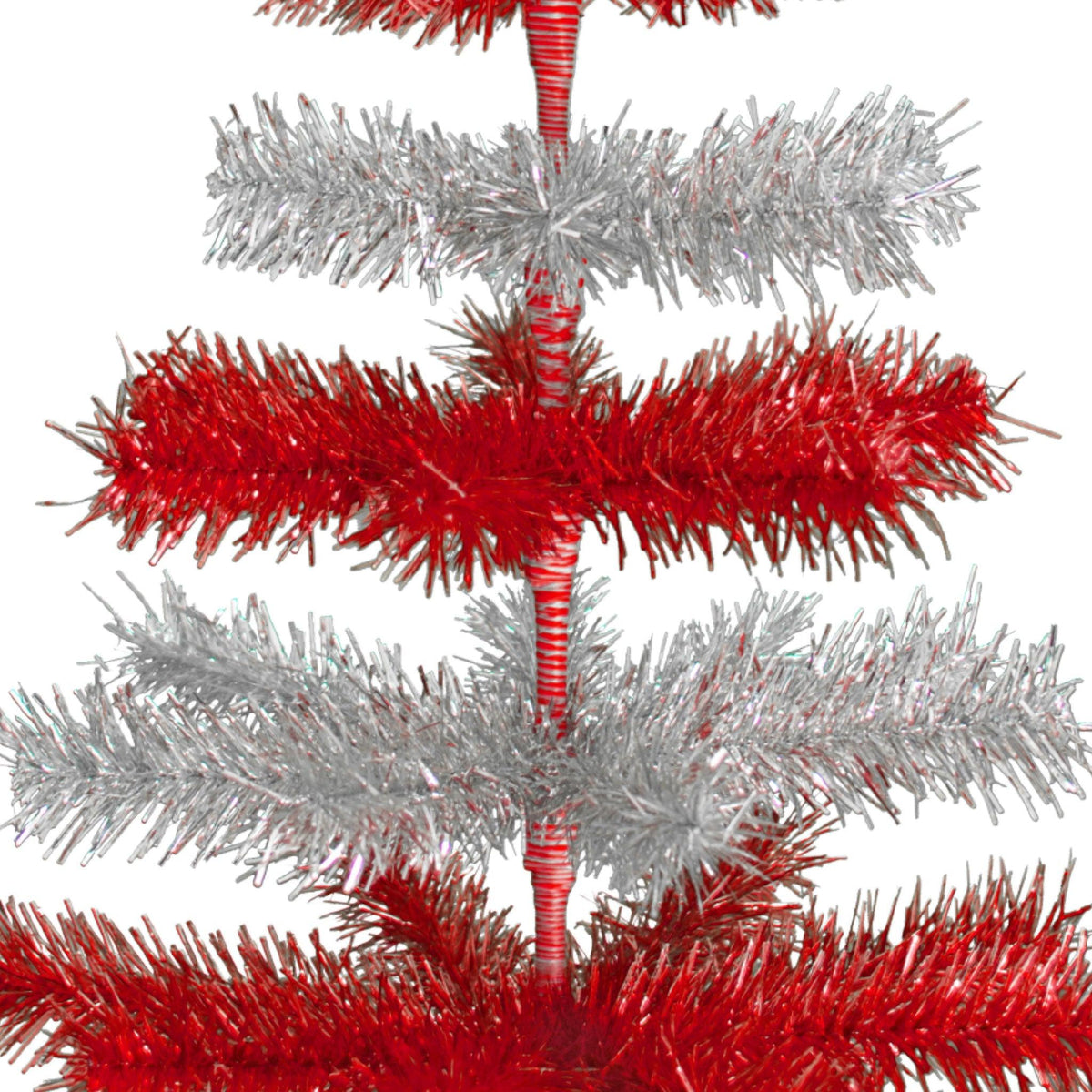 Red & Silver Layered Tinsel Christmas Trees!    Decorate for the holidays with a Shiny Red and Metallic Silver retro-style Christmas Tree.  On sale now at leedisplay.com