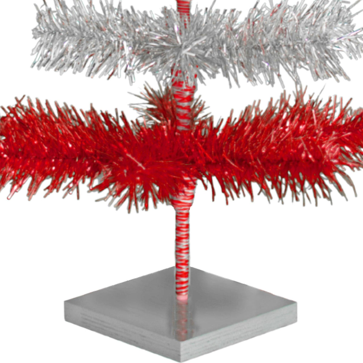 Red & Silver Layered Tinsel Christmas Trees!    Decorate for the holidays with a Shiny Red and Metallic Silver retro-style Christmas Tree.  On sale now at leedisplay.com