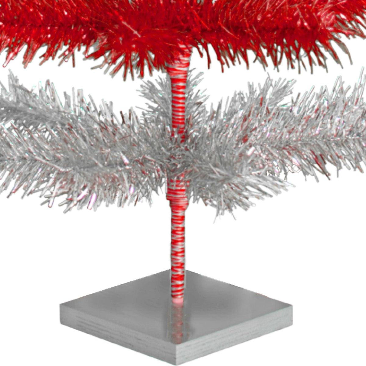 Red & Silver Layered Tinsel Christmas Trees!    Decorate for the holidays with a Shiny Red and Metallic Silver retro-style Christmas Tree.  On sale now at leedisplay.com