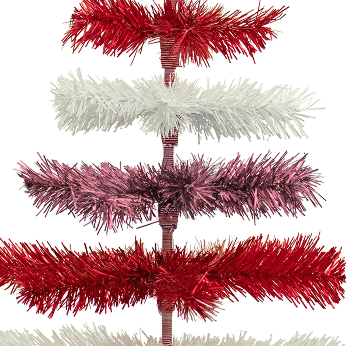 Red, White, and Pink Layered Tinsel Christmas Trees made by hand in the USA     Decorate for the holidays with retro Valentine's Day-themed Trees and start creating your centerpiece.  Shop now at leedisplay.com