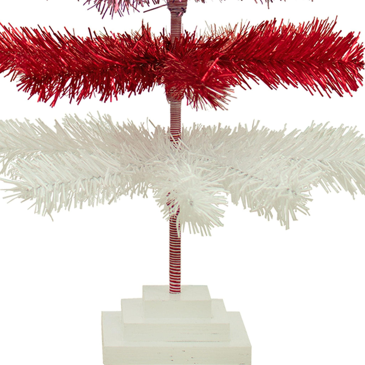 Red, White, and Pink Layered Tinsel Christmas Trees made by hand in the USA     Decorate for the holidays with retro Valentine's Day-themed Trees and start creating your centerpiece.  Shop now at leedisplay.com