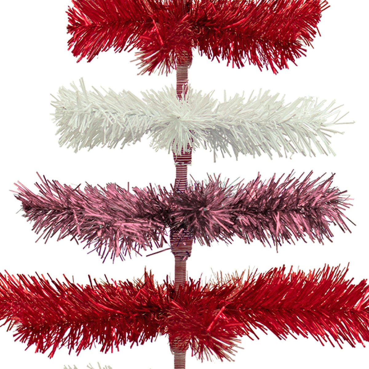 Red, White, and Pink Layered Tinsel Christmas Trees made by hand in the USA     Decorate for the holidays with retro Valentine's Day-themed Trees and start creating your centerpiece.  Shop now at leedisplay.com