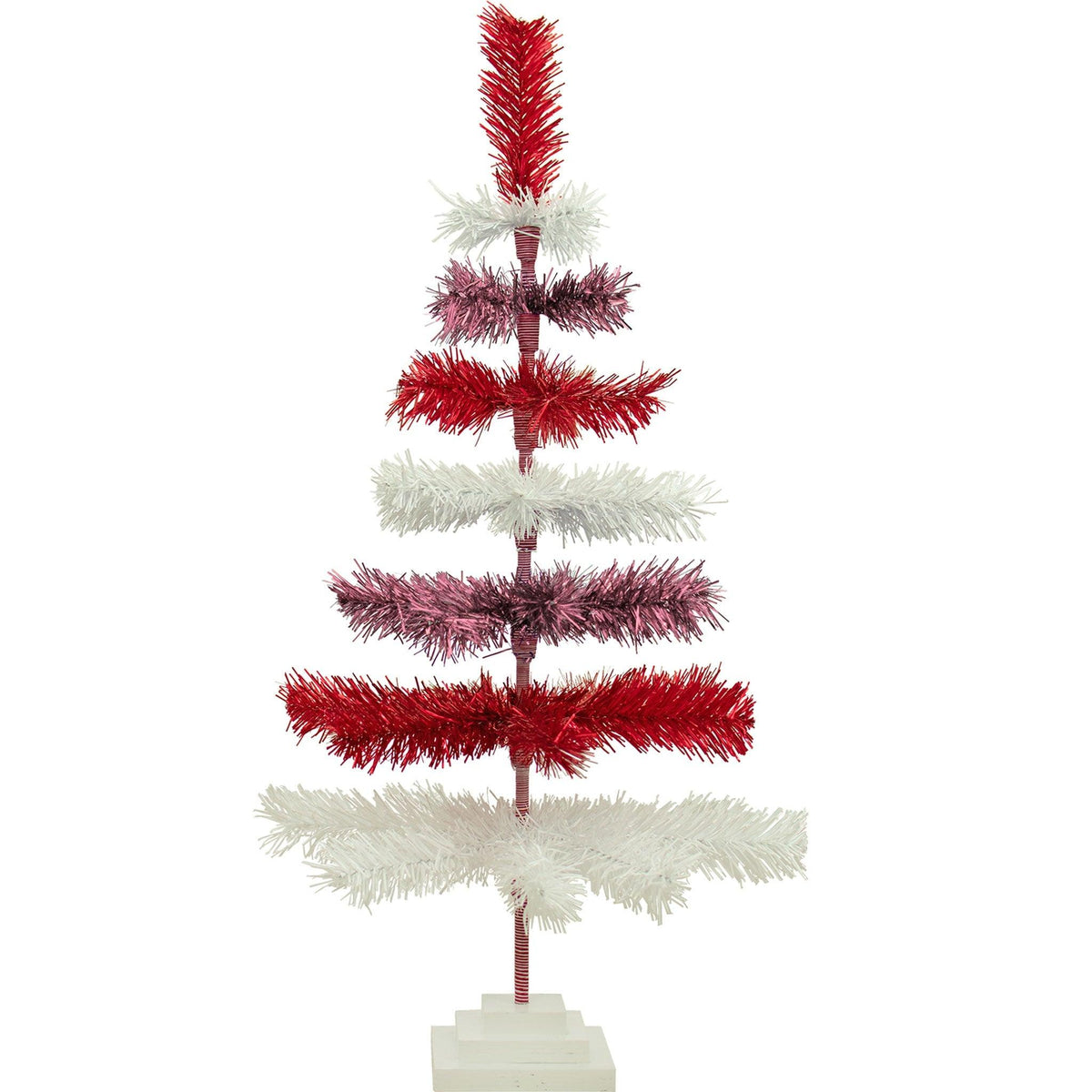 Red, White, and Pink Layered Tinsel Christmas Trees made by hand in the USA     Decorate for the holidays with retro Valentine's Day-themed Trees and start creating your centerpiece.  Shop now at leedisplay.com